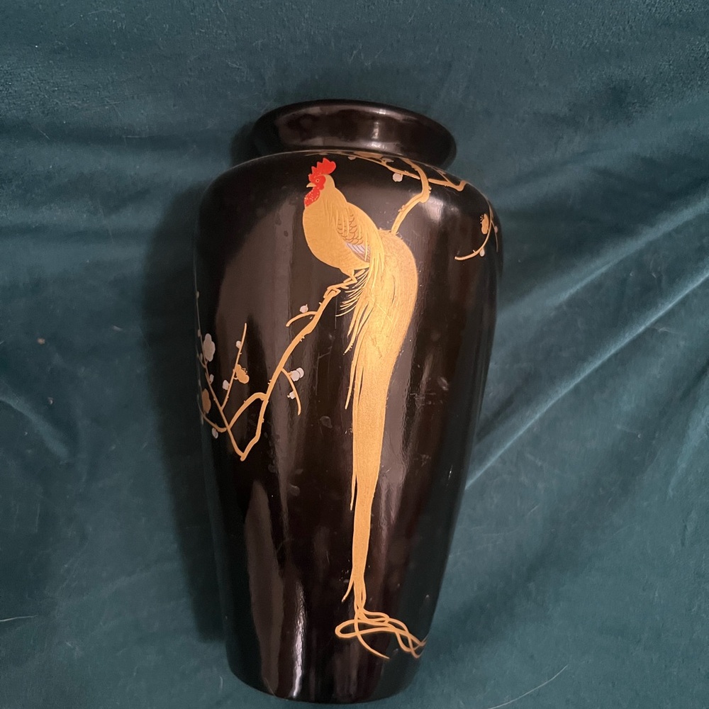 Elegant Black and Gold Vase with Striking Accents